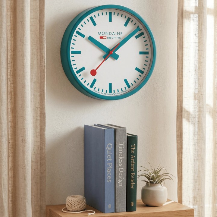 Obrázek Nástěnné hodiny MONDAINE Transformative Teal Limited Edition